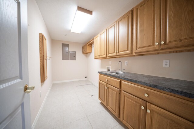 918 Dogwood Ridge Dr, Diboll, TX 75941 - laundry area featuring hookup for a washing machine, cabinet space, baseboards, and electric panel