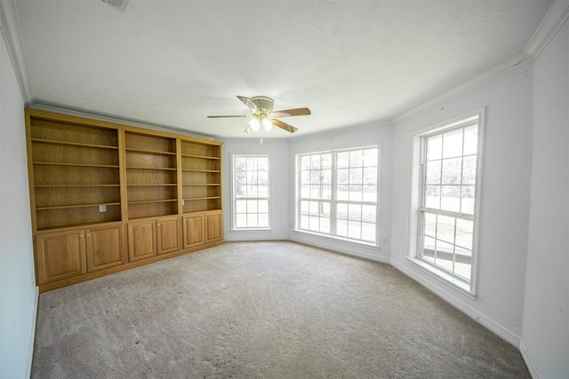 918 Dogwood Ridge Dr, Diboll, TX 75941 - carpeted spare room with ceiling fan, ornamental molding, and baseboards