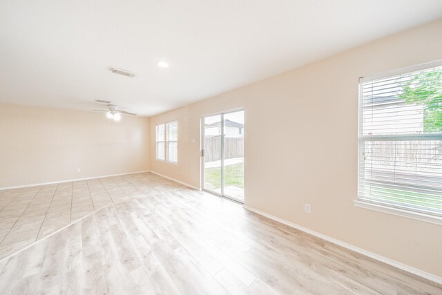 22802 Sherioaks Ln, Spring, TX 77389 - unfurnished room featuring baseboards, light wood-style floors, and ceiling fan