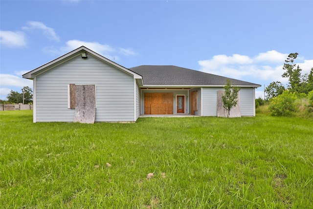 332 County Road 3567, Cleveland, TX 77327 - rear view of house featuring a yard