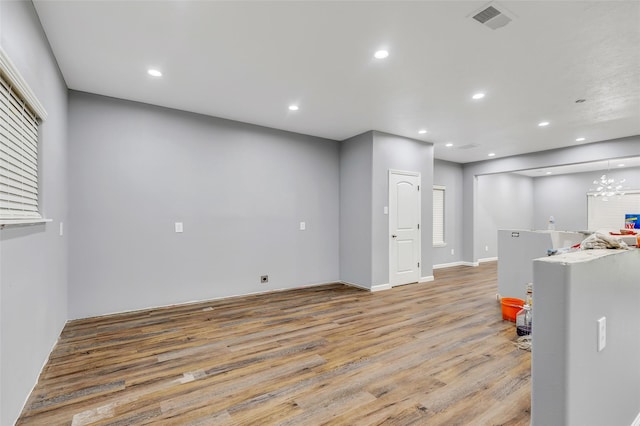 332 County Road 3567, Cleveland, TX 77327 - below grade area with light wood-style flooring and recessed lighting