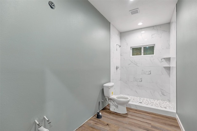 332 County Road 3567, Cleveland, TX 77327 - full bath with a marble finish shower, wood finished floors, and recessed lighting