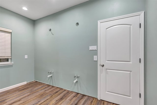 332 County Road 3567, Cleveland, TX 77327 - spare room featuring wood finished floors and recessed lighting
