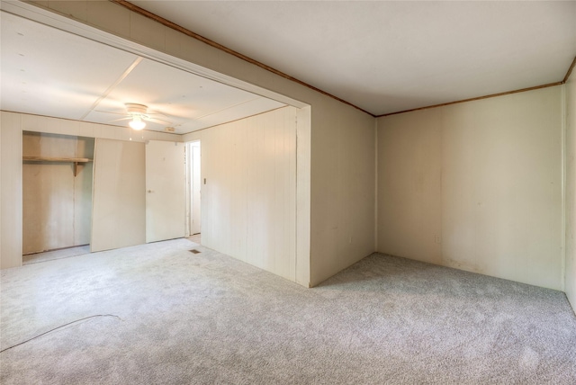 330 Oak Tree Dr, Point Blank, TX 77364 - unfurnished bedroom featuring carpet floors, a closet, and crown molding