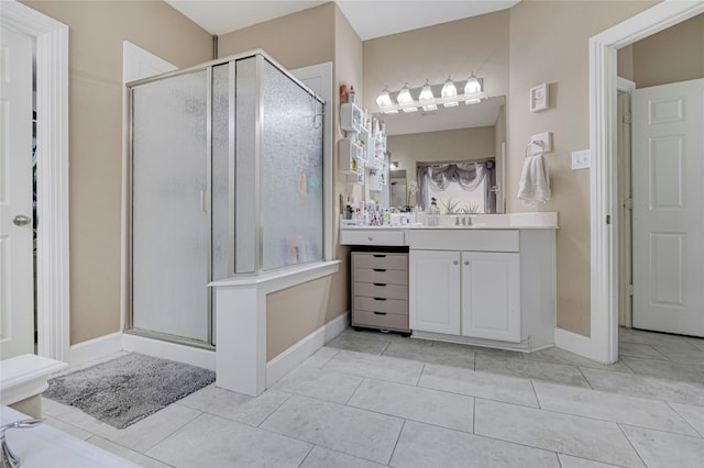 16946 Creek Mountain Dr, Houston, TX 77084 - full bath with vanity, a shower stall, tile patterned flooring, and baseboards