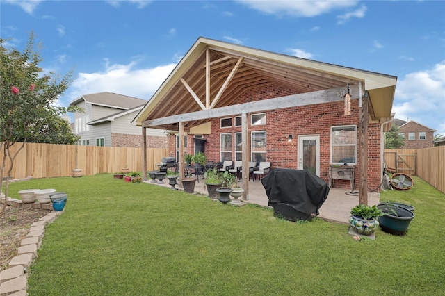 16946 Creek Mountain Dr, Houston, TX 77084 - back of house with brick siding and a patio area