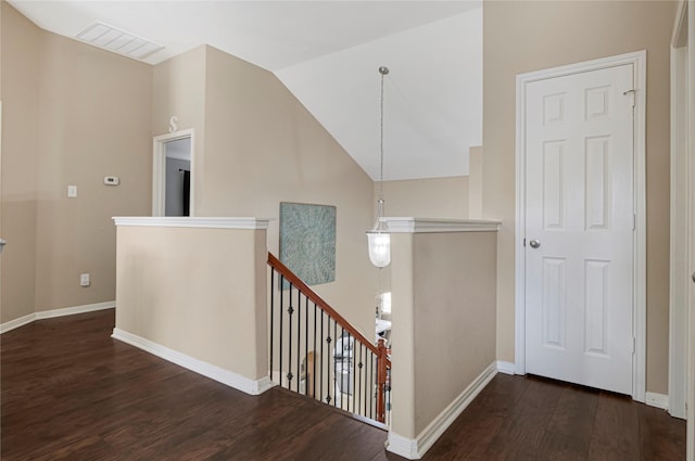 16946 Creek Mountain Dr, Houston, TX 77084 - staircase featuring wood finished floors, vaulted ceiling, and baseboards