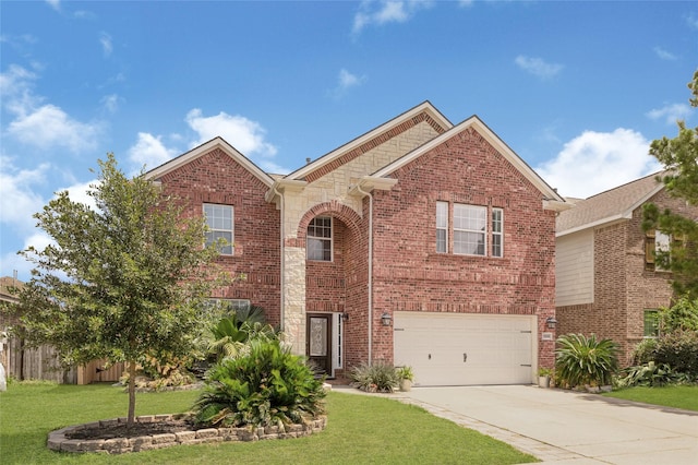 16946 Creek Mountain Dr, Houston, TX 77084 - traditional-style house featuring driveway, a garage, a front yard, and brick siding