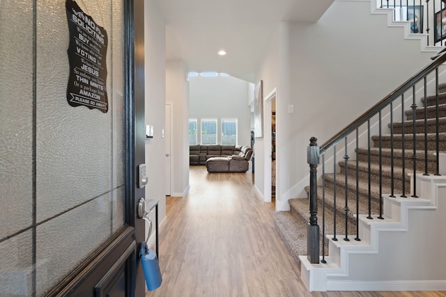 25718 Balsamwood Dr, Tomball, TX 77375 - foyer entrance with wood finished floors, stairway, recessed lighting, and a towering ceiling