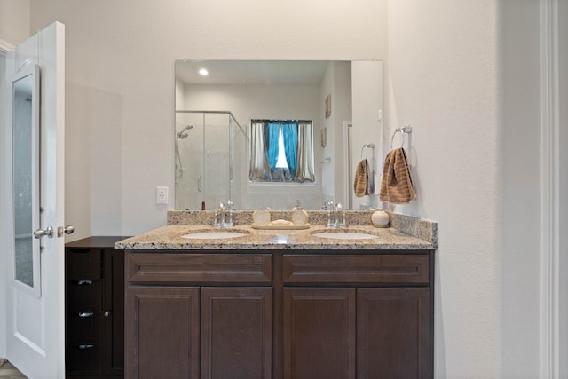 25718 Balsamwood Dr, Tomball, TX 77375 - full bath featuring a stall shower and double vanity