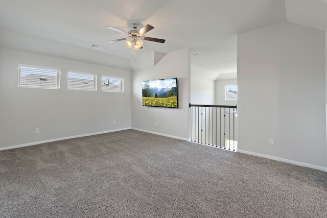 25718 Balsamwood Dr, Tomball, TX 77375 - empty room with a ceiling fan, lofted ceiling, and carpet floors