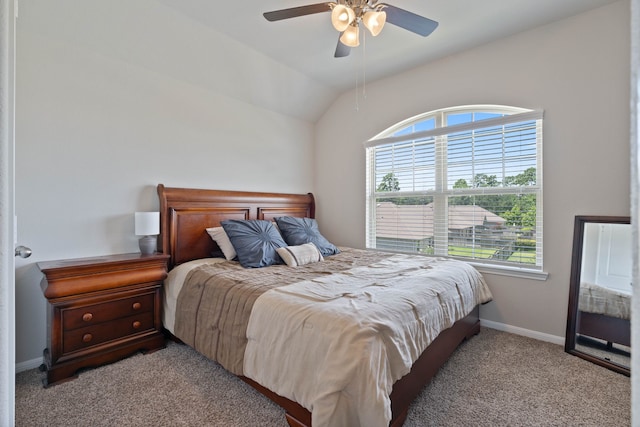 25718 Balsamwood Dr, Tomball, TX 77375 - bedroom with multiple windows, carpet flooring, lofted ceiling, and ceiling fan