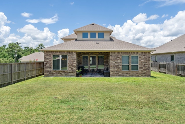 25718 Balsamwood Dr, Tomball, TX 77375 - back of property featuring brick siding, a fenced backyard, and roof with shingles