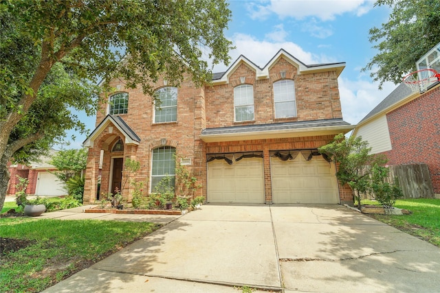 13614 Birch Canyon Ct, Houston, TX 77041 - traditional home with an attached garage, concrete driveway, and brick siding