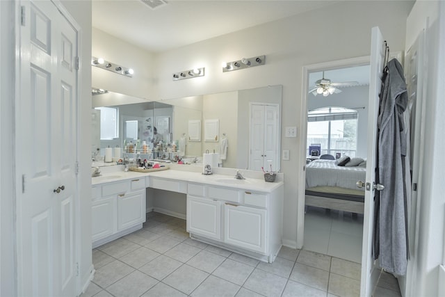 13614 Birch Canyon Ct, Houston, TX 77041 - ensuite bathroom with double vanity, tile patterned floors, and ceiling fan