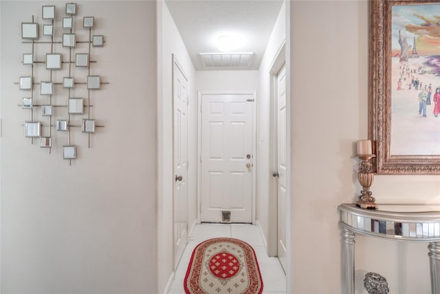 13614 Birch Canyon Ct, Houston, TX 77041 - hall featuring light tile patterned floors and baseboards