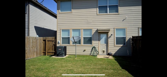 2726 Maybrook Hollow Ln, Houston, TX 77047 - rear view of property featuring central air condition unit
