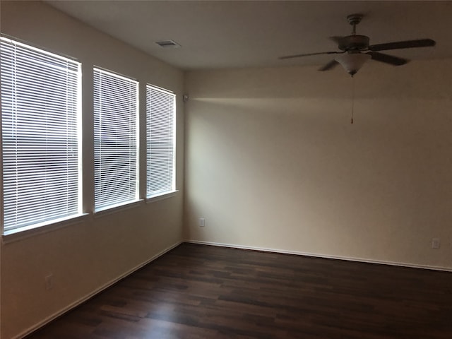 2726 Maybrook Hollow Ln, Houston, TX 77047 - empty room with wood finished floors, ceiling fan, and baseboards