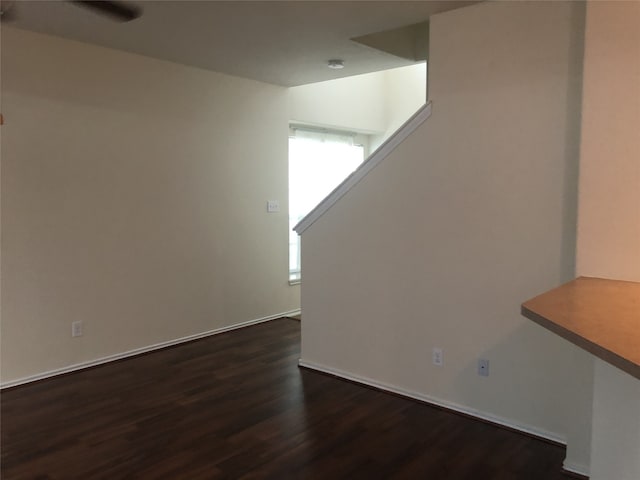 2726 Maybrook Hollow Ln, Houston, TX 77047 - unfurnished room with dark wood-type flooring and baseboards