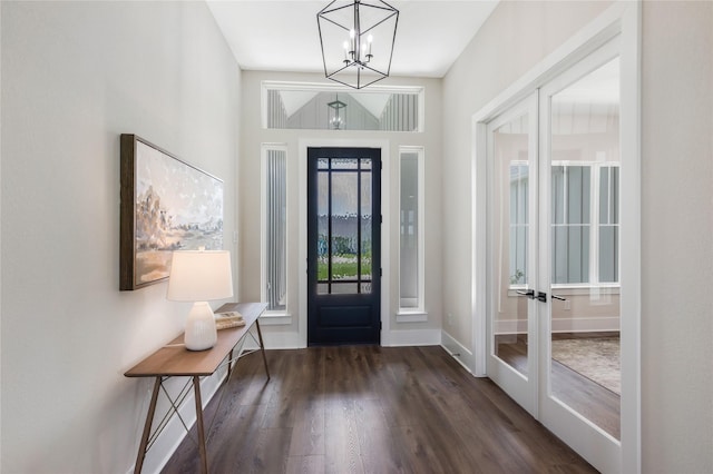 1437 Bluebonnet Ridge Dr, Chappell Hill, TX 77426 - foyer with a chandelier, dark wood-style floors, baseboards, and french doors