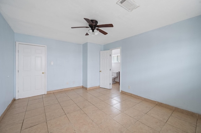 11707 N Nottingham Cir, Houston, TX 77071 - spare room with ceiling fan, light tile patterned floors, and baseboards