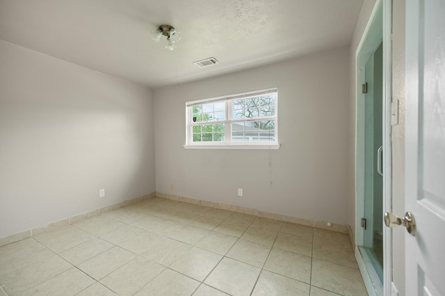 11707 N Nottingham Cir, Houston, TX 77071 - unfurnished room featuring light tile patterned floors and baseboards