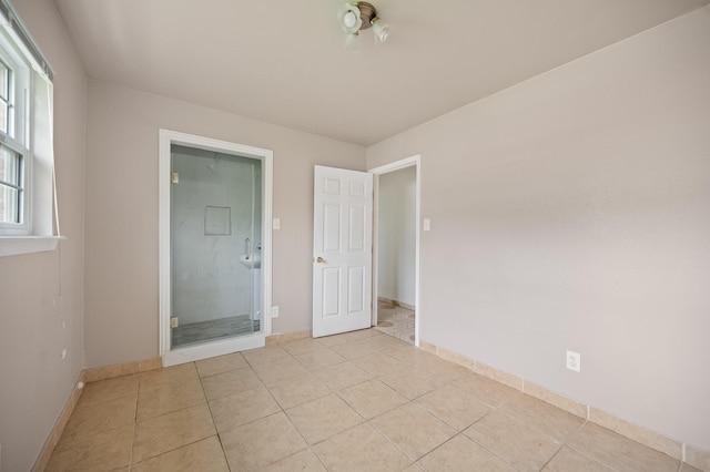 11707 N Nottingham Cir, Houston, TX 77071 - empty room with baseboards and light tile patterned floors