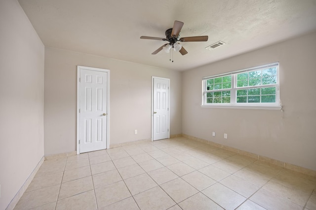 11707 N Nottingham Cir, Houston, TX 77071 - unfurnished room featuring a ceiling fan and light tile patterned floors