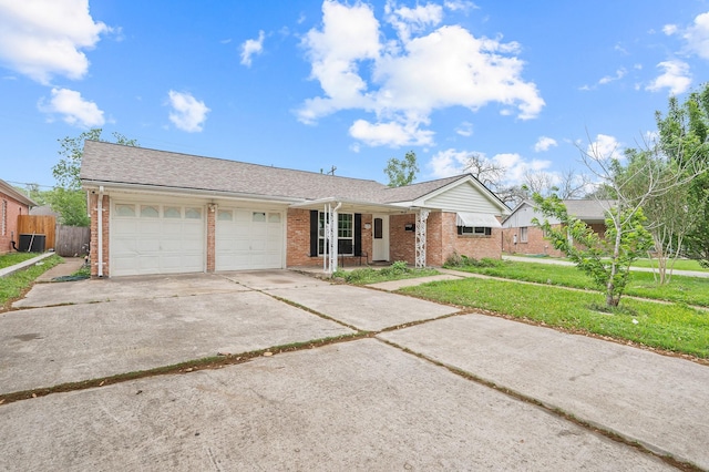 11707 N Nottingham Cir, Houston, TX 77071 - ranch-style house with brick siding, an attached garage, cooling unit, concrete driveway, and a shingled roof