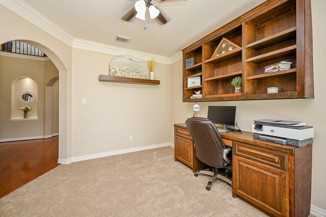 20803 Twisted Leaf Dr, Cypress, TX 77433 - home office featuring ceiling fan, arched walkways, crown molding, and light colored carpet