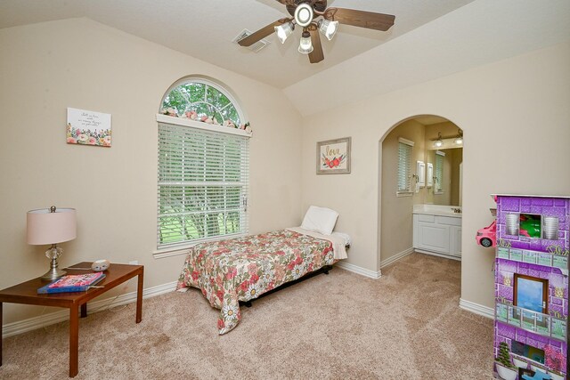 20803 Twisted Leaf Dr, Cypress, TX 77433 - bedroom featuring lofted ceiling, arched walkways, carpet flooring, ensuite bath, and a ceiling fan