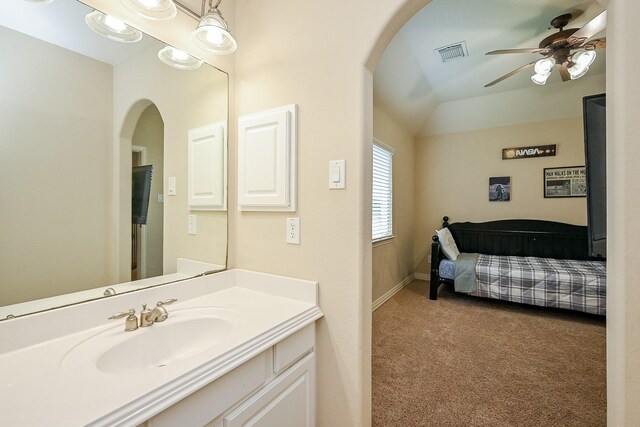 20803 Twisted Leaf Dr, Cypress, TX 77433 - ensuite bathroom featuring vanity, a ceiling fan, and vaulted ceiling