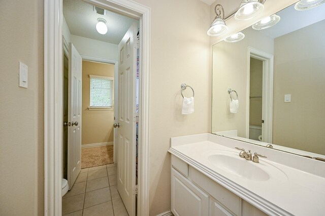 20803 Twisted Leaf Dr, Cypress, TX 77433 - bathroom with vanity and tile patterned flooring