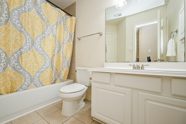 20803 Twisted Leaf Dr, Cypress, TX 77433 - bathroom featuring tile patterned flooring, vanity, and shower / tub combo with curtain