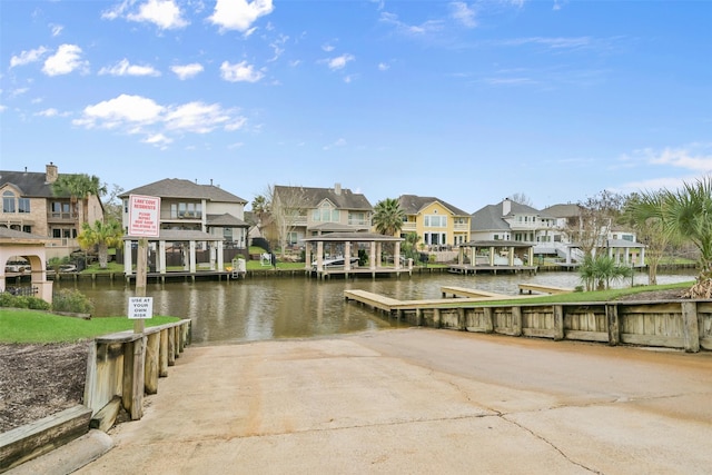 2231 Water Way, Seabrook, TX 77586 - dock with a boat ramp, a residential view, and a water view