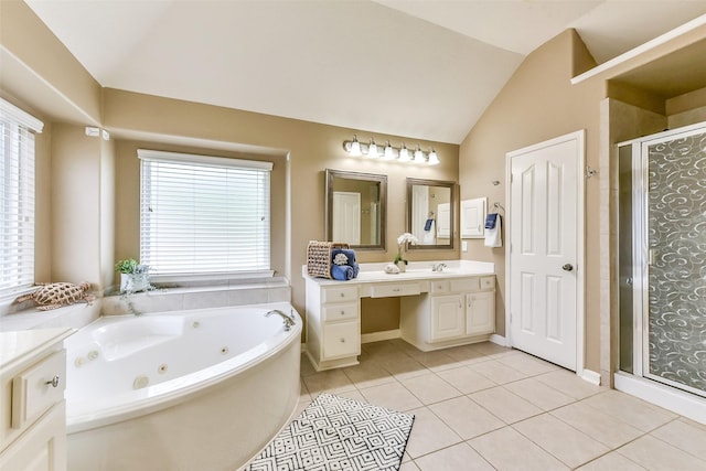 2231 Water Way, Seabrook, TX 77586 - bathroom with vaulted ceiling, vanity, a shower stall, a whirlpool tub, and tile patterned floors