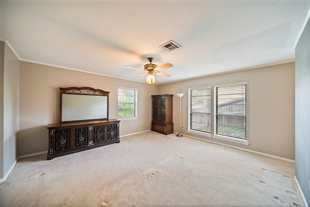 2709 Cherry Ln, Pasadena, TX 77502 - unfurnished living room featuring baseboards, ornamental molding, carpet floors, and ceiling fan