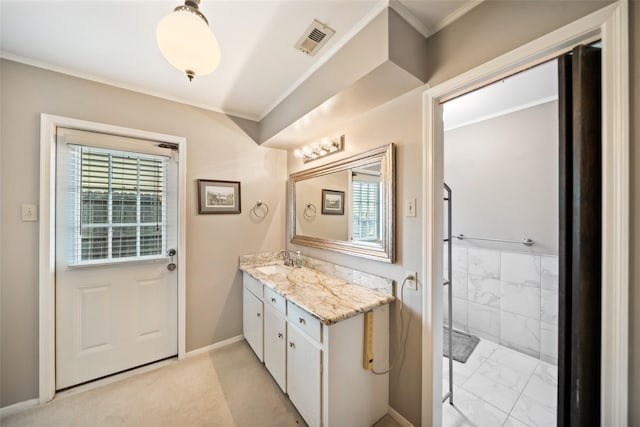 2709 Cherry Ln, Pasadena, TX 77502 - full bath featuring vanity, healthy amount of natural light, crown molding, marble look tiles, and baseboards