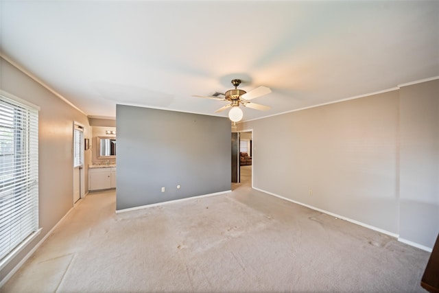 2709 Cherry Ln, Pasadena, TX 77502 - empty room featuring crown molding, light colored carpet, and baseboards