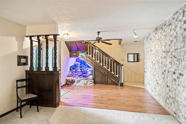2709 Cherry Ln, Pasadena, TX 77502 - entryway with stairway, ceiling fan, and wood finished floors