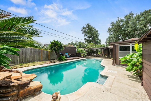 2709 Cherry Ln, Pasadena, TX 77502 - view of pool featuring a fenced backyard and a patio area