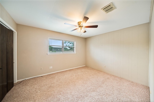 2709 Cherry Ln, Pasadena, TX 77502 - unfurnished bedroom featuring carpet floors, a ceiling fan, and a closet