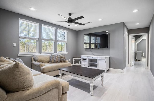 148 Wagon Pass Dr, Huntsville, TX 77340 - living room featuring ceiling fan, baseboards, recessed lighting, and light wood-type flooring