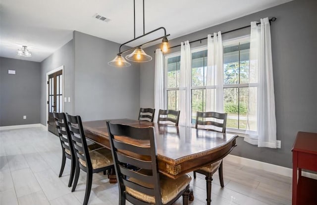 148 Wagon Pass Dr, Huntsville, TX 77340 - dining area featuring baseboards