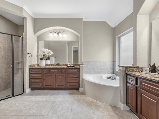 20722 Lavone Dr, Porter, TX 77365 - full bathroom with crown molding, vanity, a shower stall, a bath, and tile patterned flooring