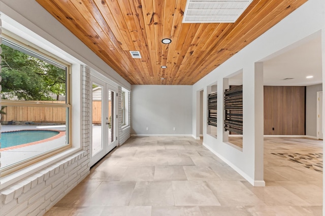 10714 Deerwood Rd, Houston, TX 77042 - unfurnished sunroom featuring french doors