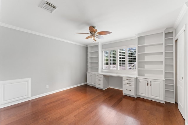 10714 Deerwood Rd, Houston, TX 77042 - unfurnished office featuring built in study area, ceiling fan, ornamental molding, and dark wood finished floors