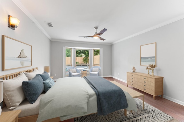 10714 Deerwood Rd, Houston, TX 77042 - bedroom with ornamental molding, wood finished floors, and a ceiling fan