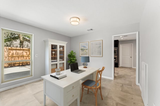 10714 Deerwood Rd, Houston, TX 77042 - office area with baseboards