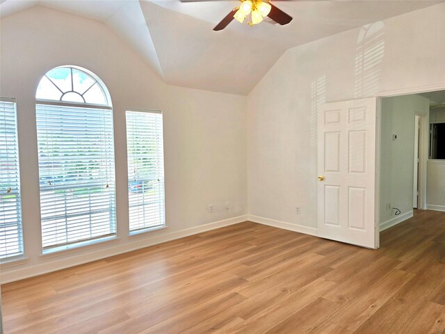 3307 Twelve Oaks Ln, Missouri City, TX 77459 - spare room featuring ceiling fan, light wood-style flooring, and lofted ceiling